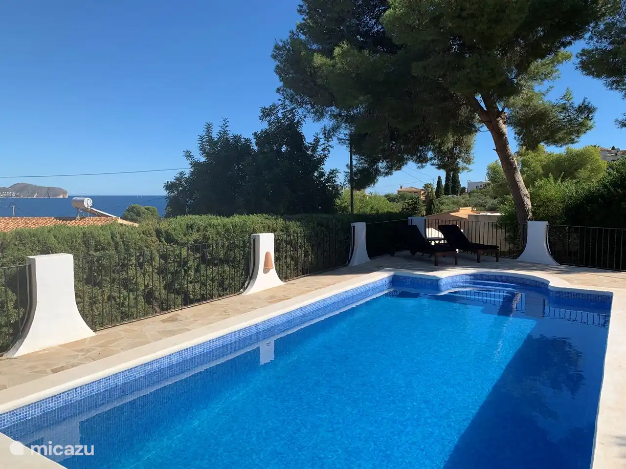 View of the swimming pool from the master bedroom