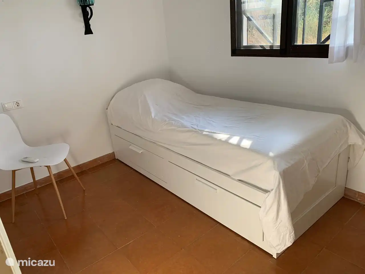 room 3 single bed extendable into a double bed, fitted wardrobe and equipped with air conditioning