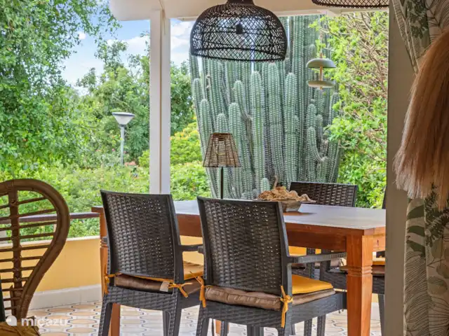 Bungalow Bossa Nova huren in Curaçao, Curacao-Midden, Piscadera - bungalow terras met uitzicht op de tropische tuin