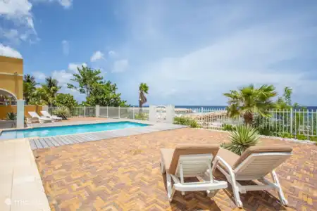 Vacation rental Curaçao, Curacao-Middle, Willemstad manor / castle Country house Flamboyan A With private pool, right on the sea