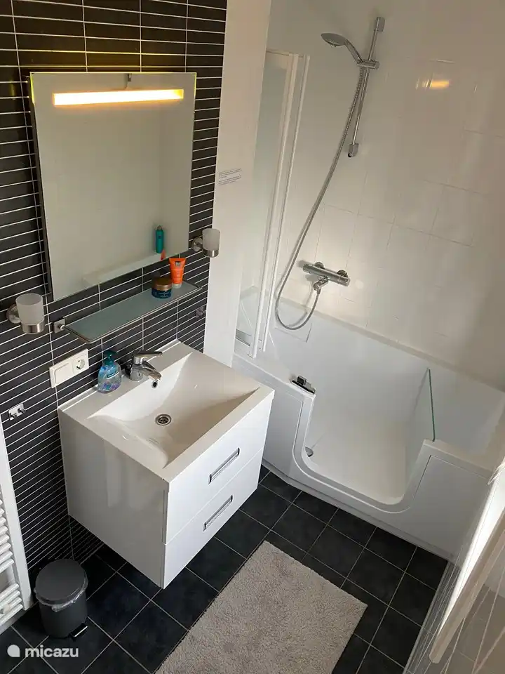 Bathroom with bath / shower