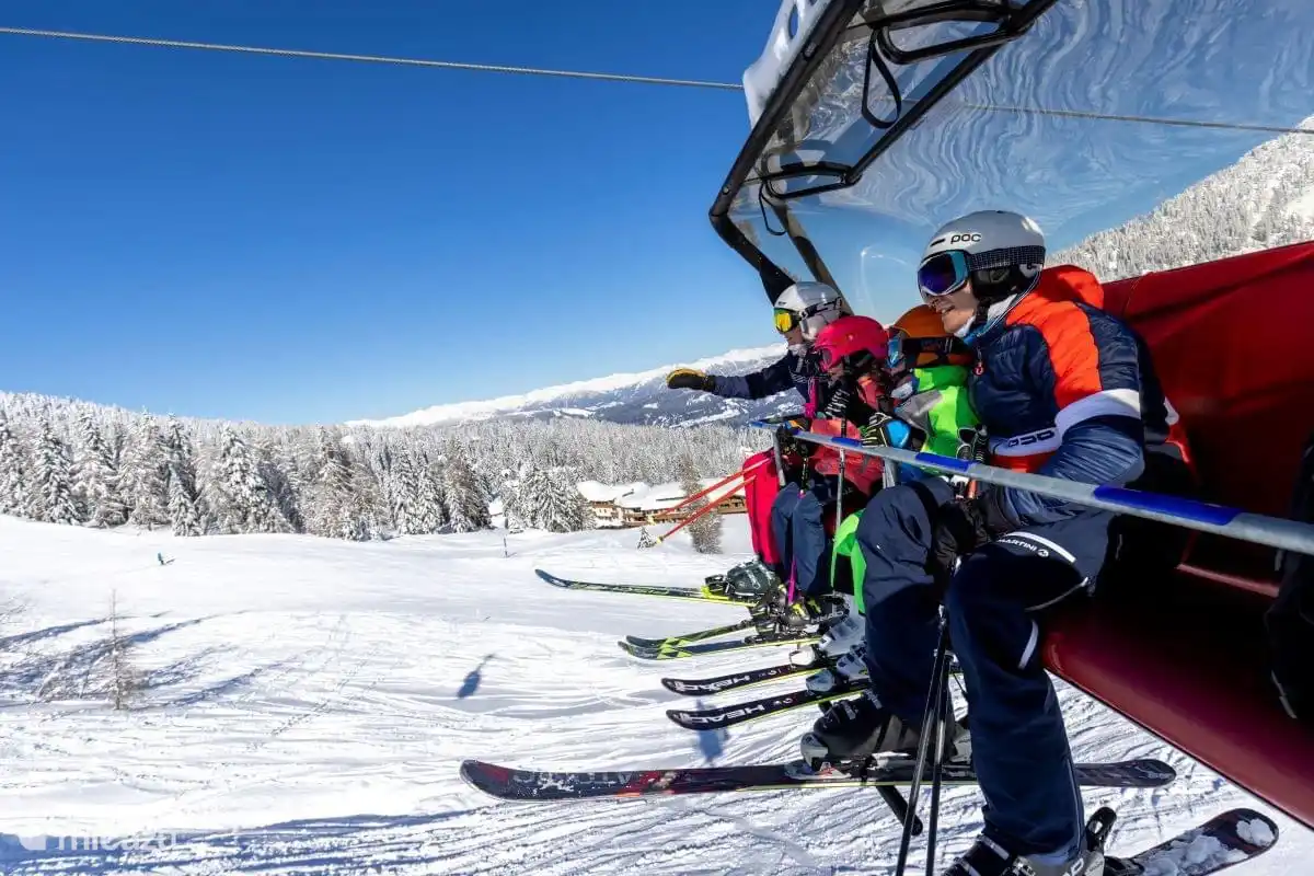 Skiing in the snow-sure ski area.