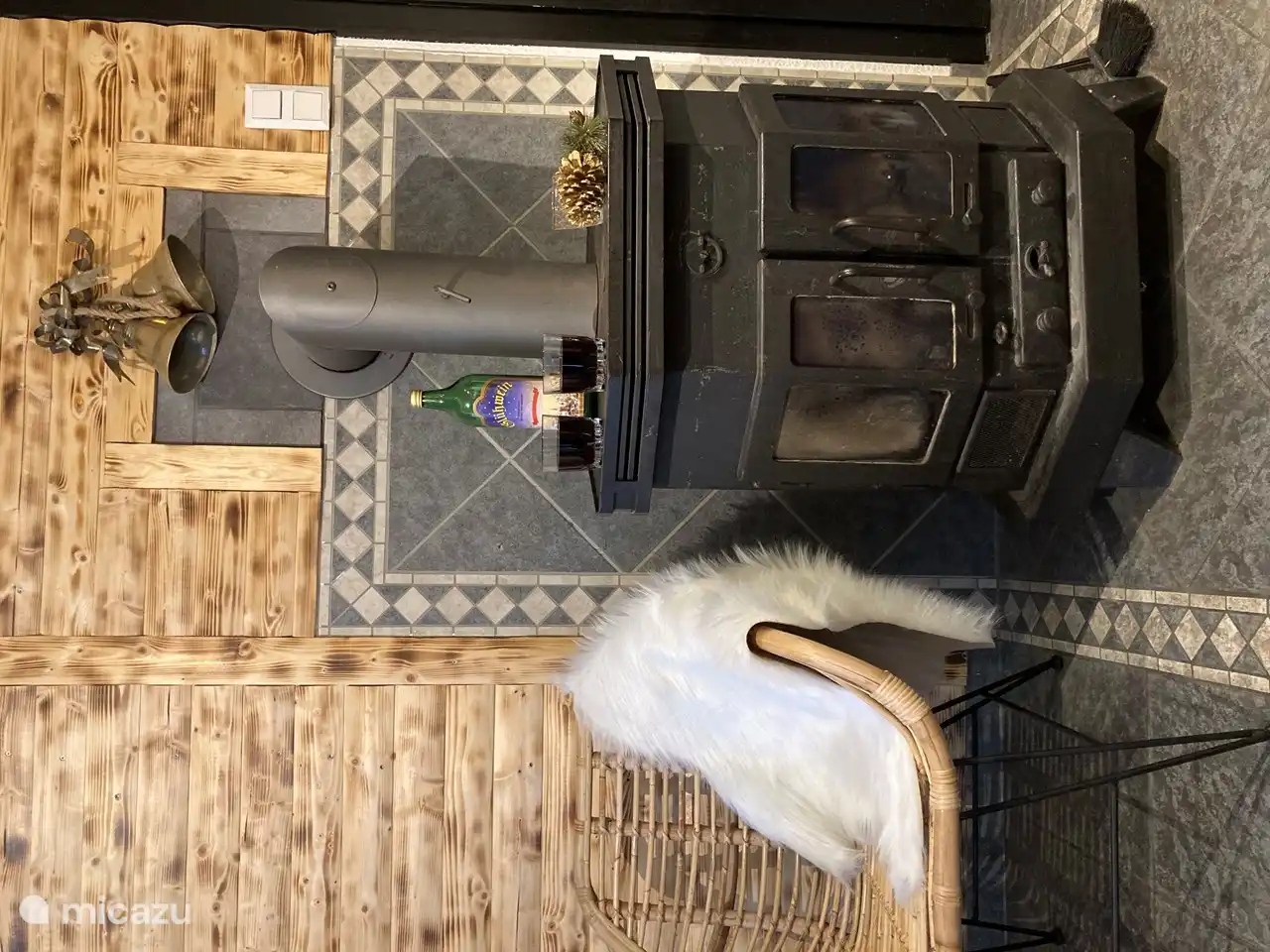 Lovely seating for two by the wood burning stove in the dining room on the ground floor.