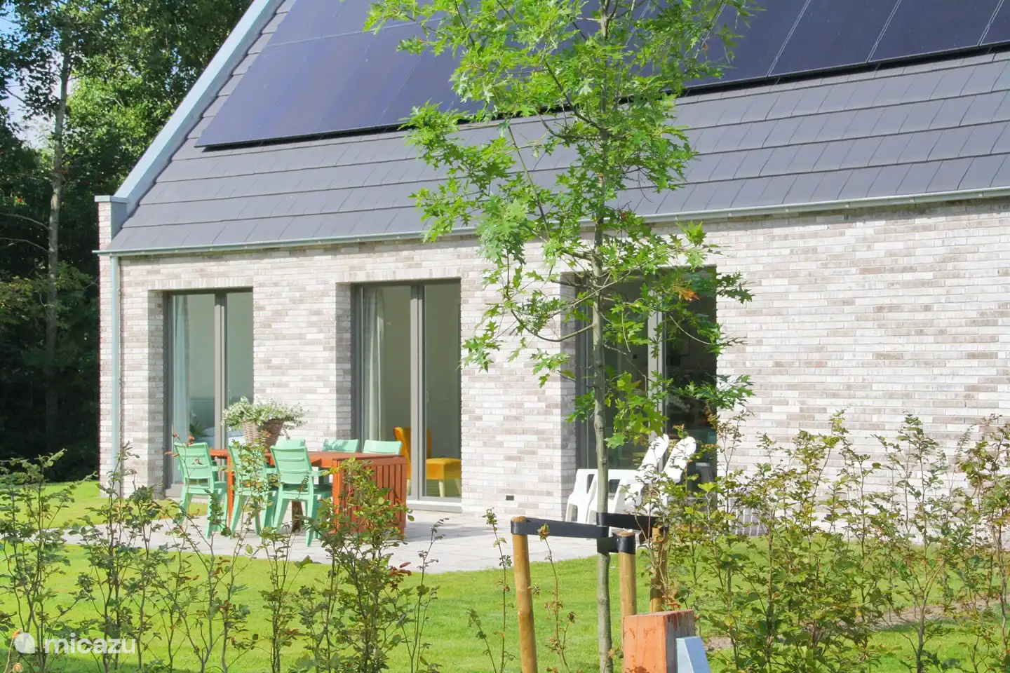 sunny terrace with garden furniture