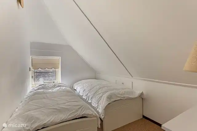 Schlafzimmer mit 2 Einzelbetten
