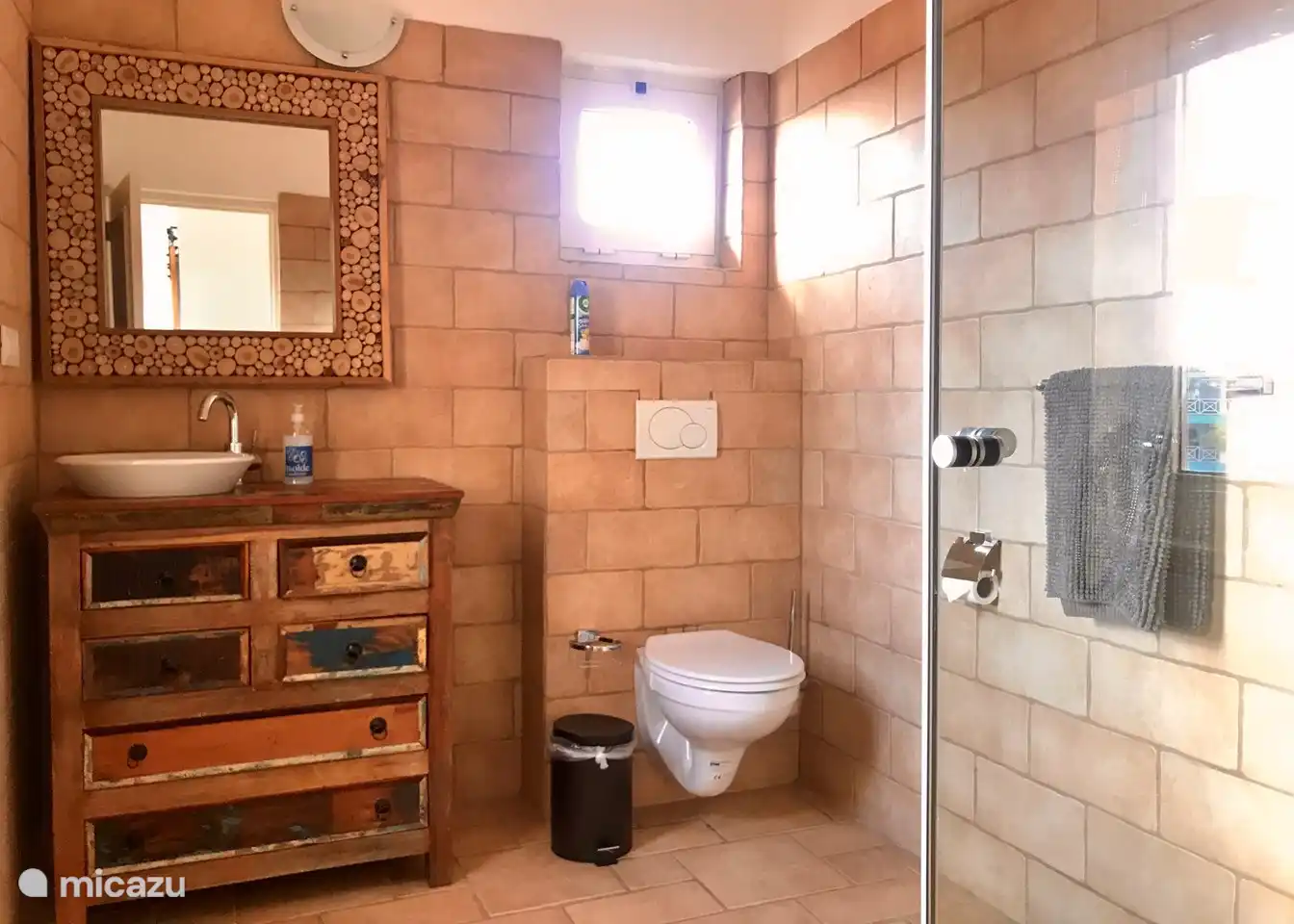 Bathroom in master bedroom with toilet, shower and sink