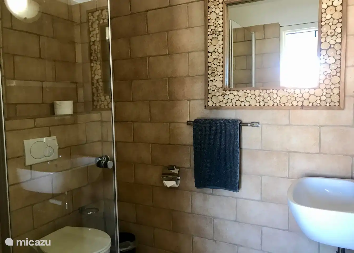 2nd bathroom with toilet, shower and sink on the 1st floor