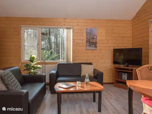 Goudooggans huren in Nederland, Noord-Brabant, Heesch - bungalow Zithoek met uitzicht op de tuin
