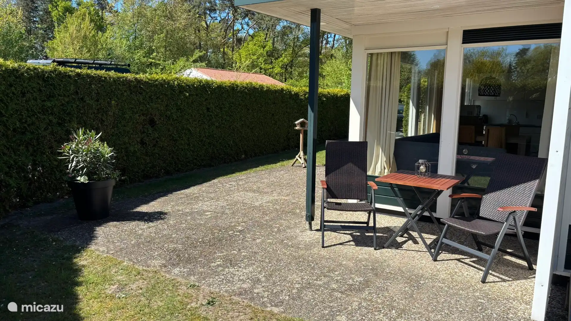Lovely place to sit out of the wind in the sun all year round.