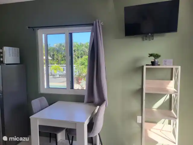 studio huren in Curaçao, Banda Ariba (oost), Montan'i Rei – Mofi Eettafel met uitzicht op zwembad