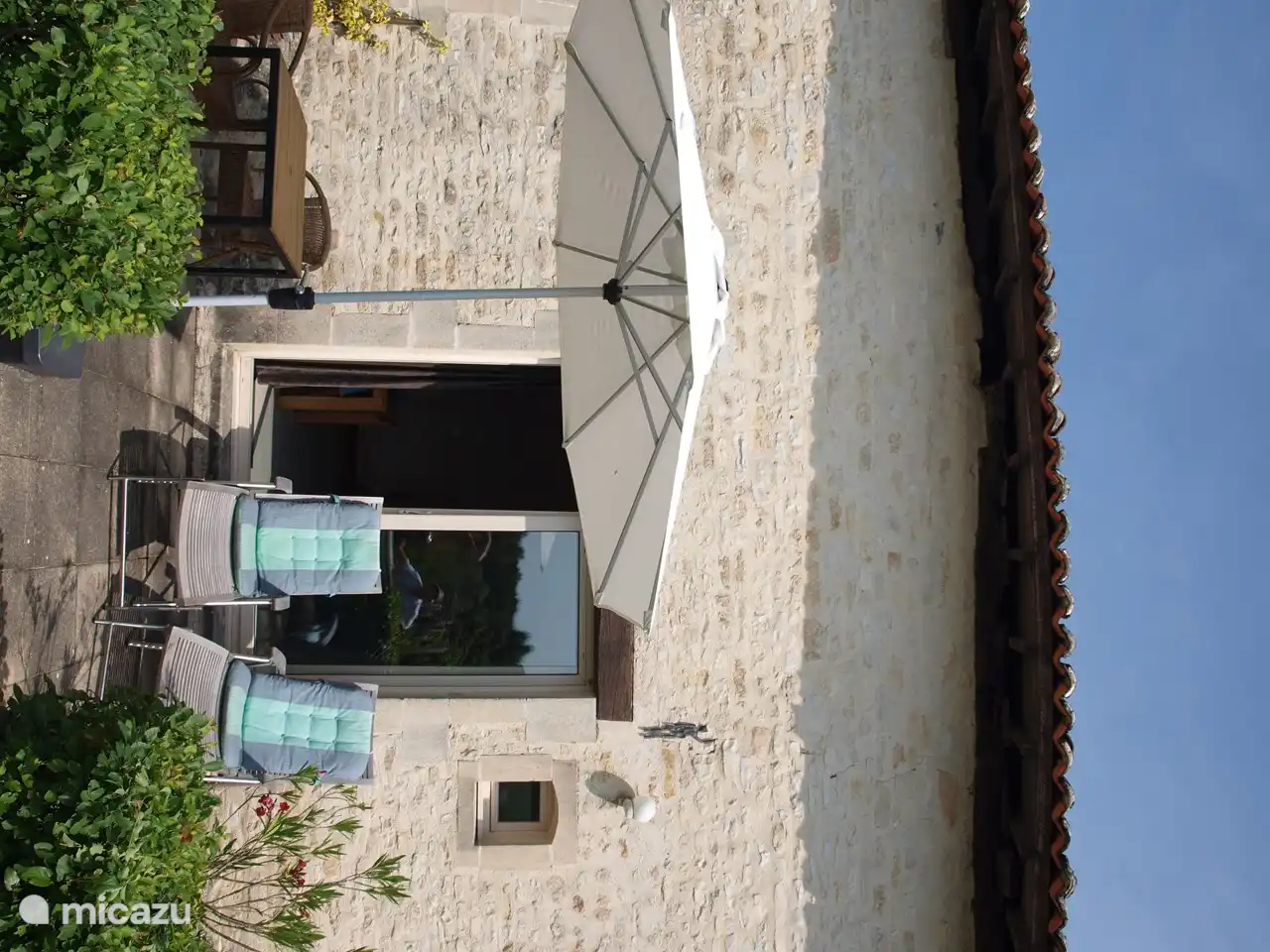 Terrace with sun loungers