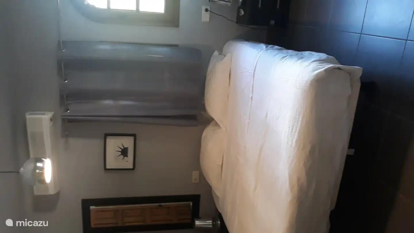 Bedroom2 with two single beds or with topper as one double bed