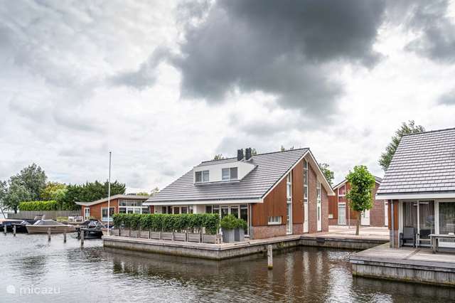 Vakantiehuis Nederland, Noord-Holland, Uitgeest - villa Luxe watervilla met sloep te huur
