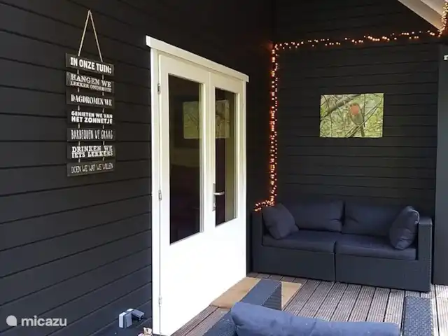 el tucan en Países Bajos, Güeldres, Emst (Epe) - casa vacacional Es maravilloso relajarse en la terraza de la casa forestal De Toekan en Emst.