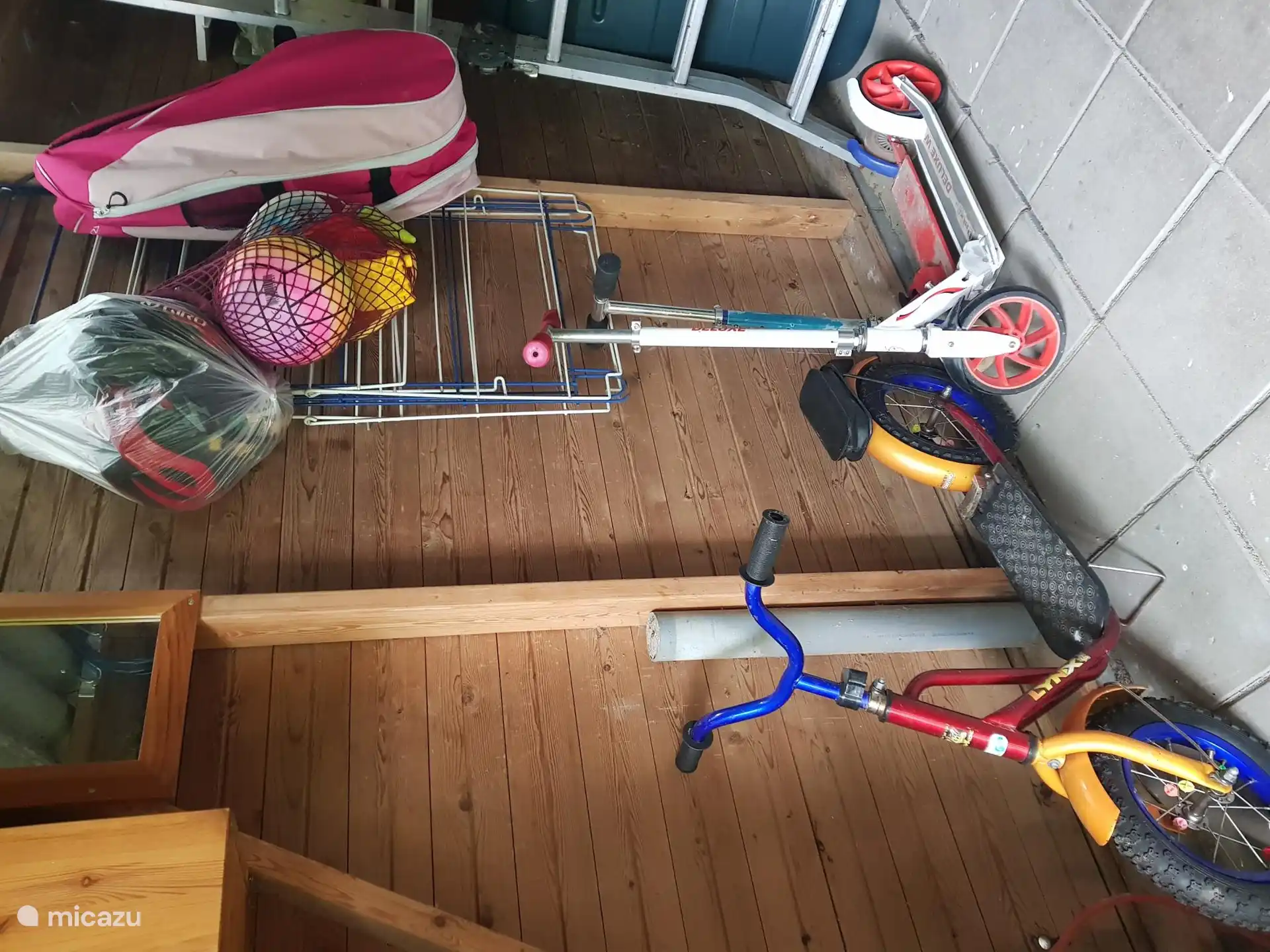 Scooters for the pump track, helmets and other play equipment available.