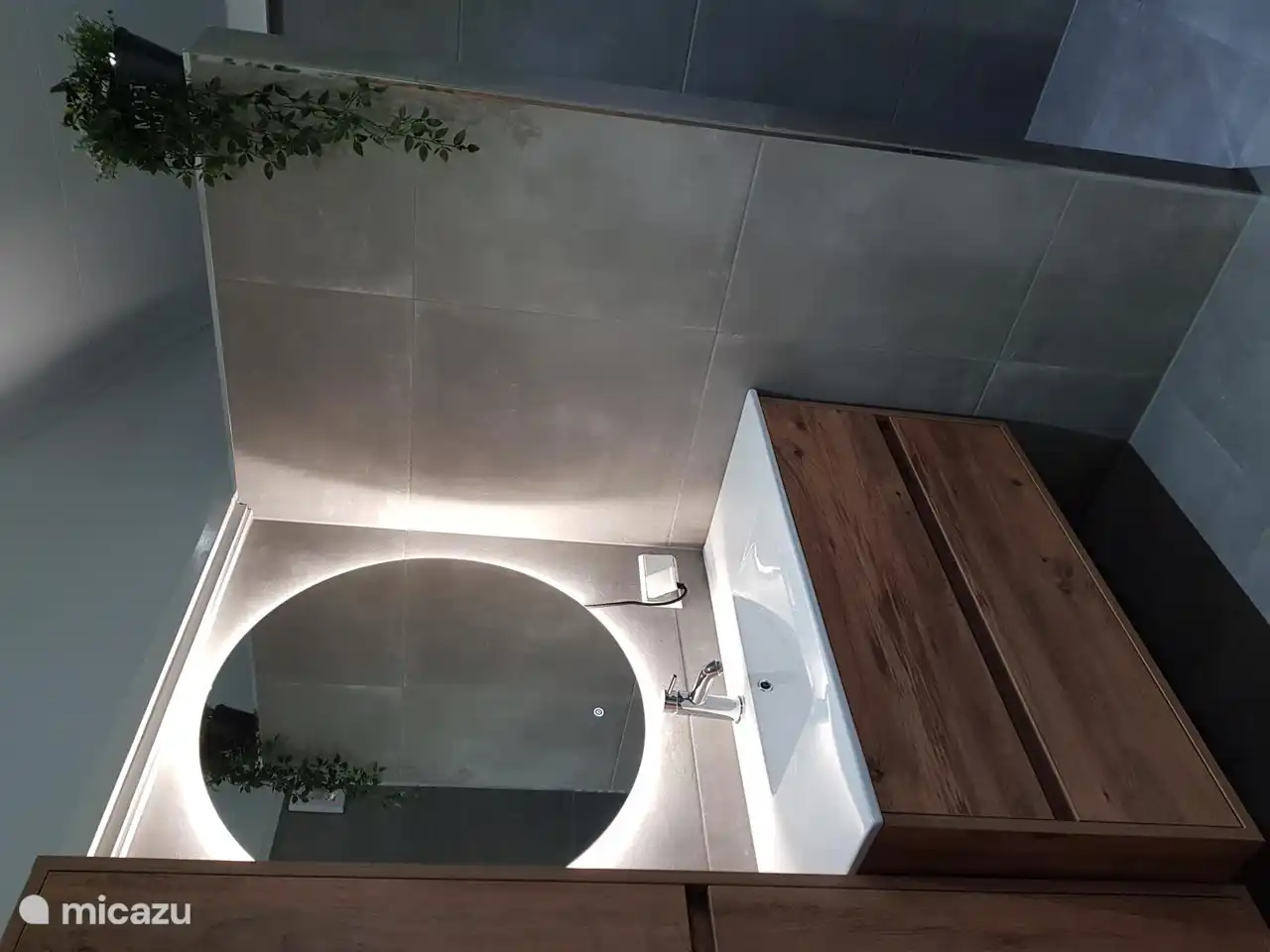 New bathroom (2022) with electric underfloor heating, vanity units and mirror with controllable lighting.