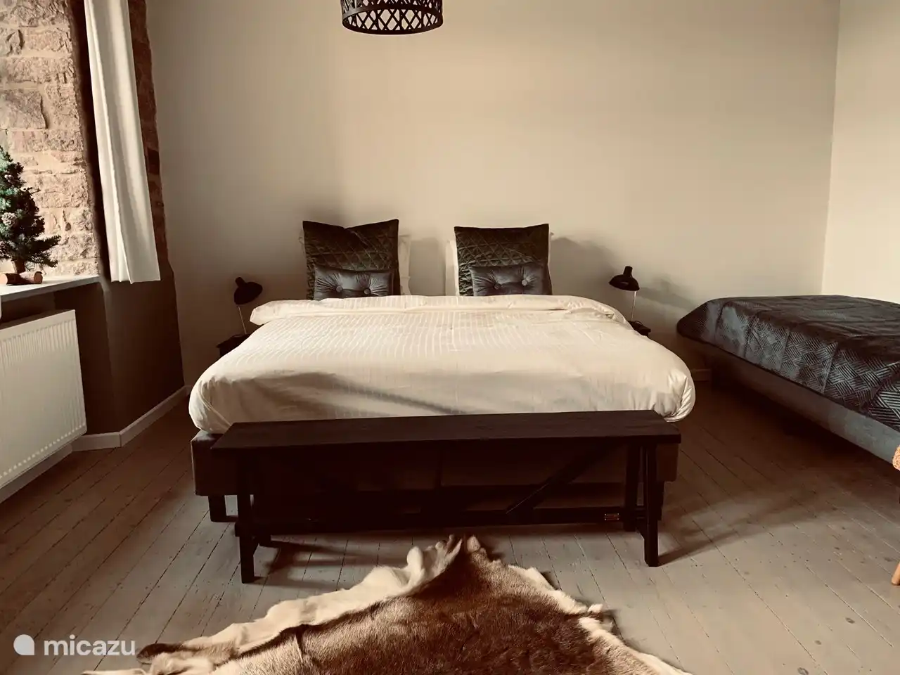 Amplio dormitorio para 3 personas.