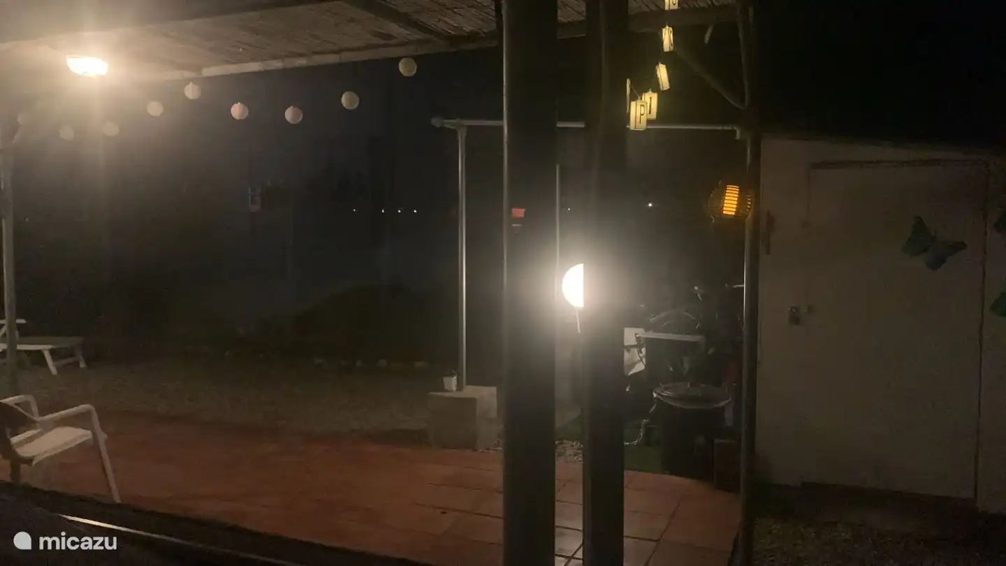 You can also fully enjoy your illuminated and covered terrace in the evening!