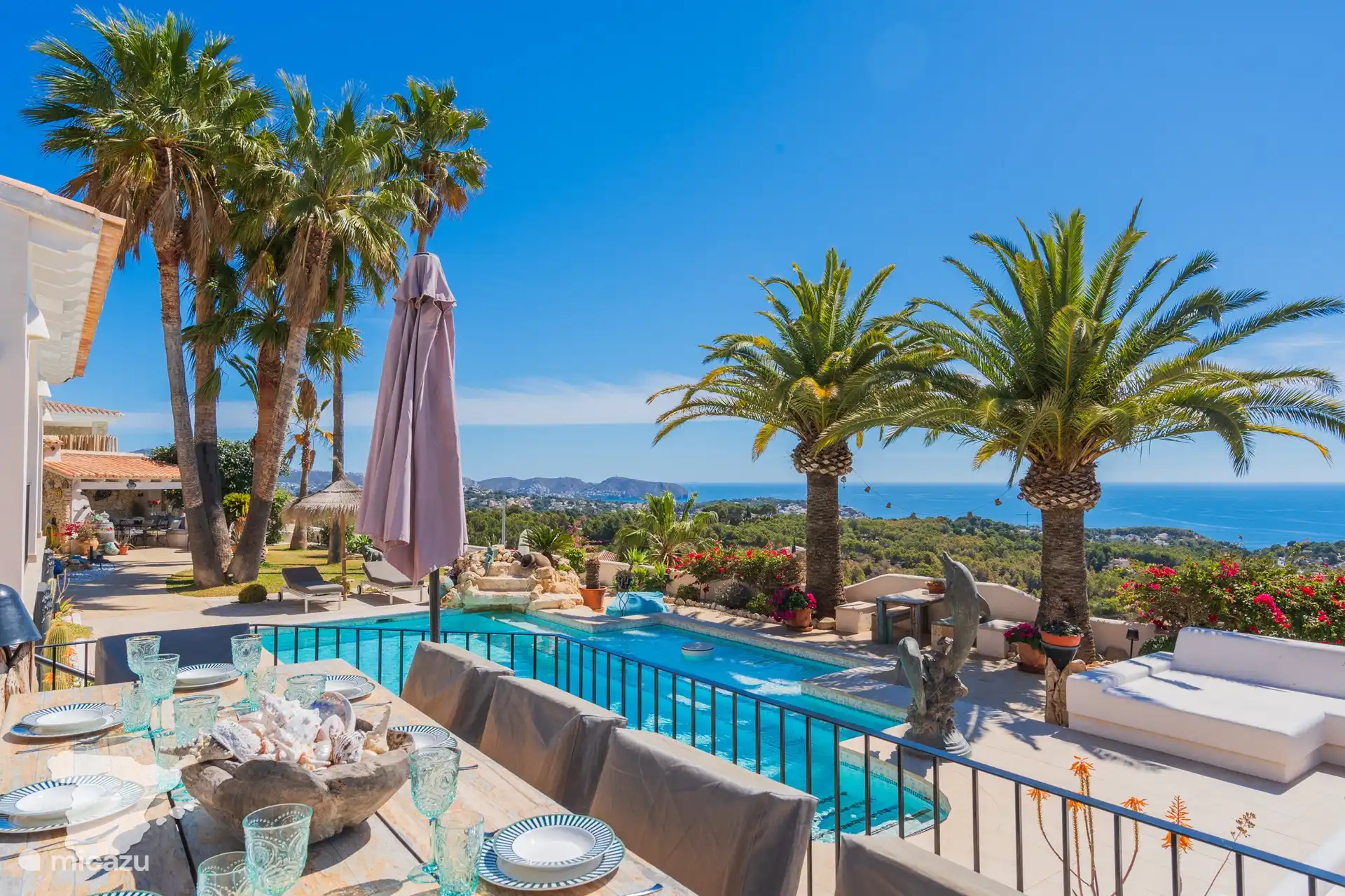 Open terrace with dining area and beautiful views!