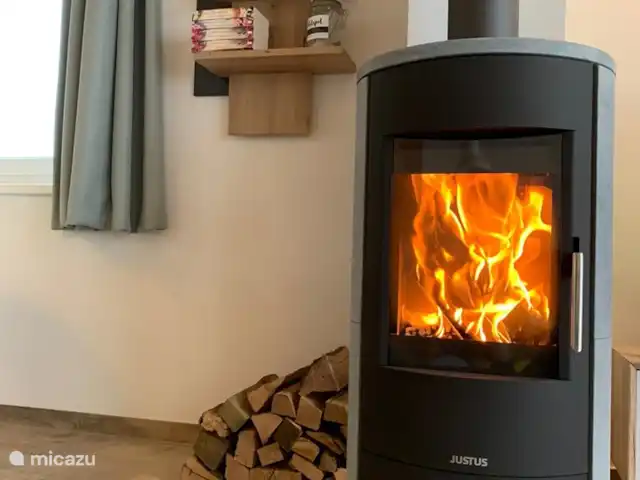 Maison Drei Madel | Autriche, Carinthie, Arnoldstein - maison de vacances Le poêle à bois dans le salon