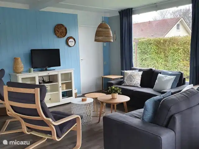 De Keizerzwaluw | Pays-Bas, Hollande du Nord, Julianadorp aan Zee - maison de vacances Asseyez-vous sur le canapé spacieux donnant sur le jardin.