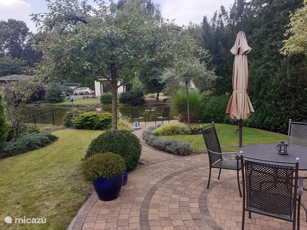 The beautifully landscaped garden with 2 seating areas with six chairs and 2 sun loungers, 3 parasols in a particularly quiet environment. You must experience the silence and nature.