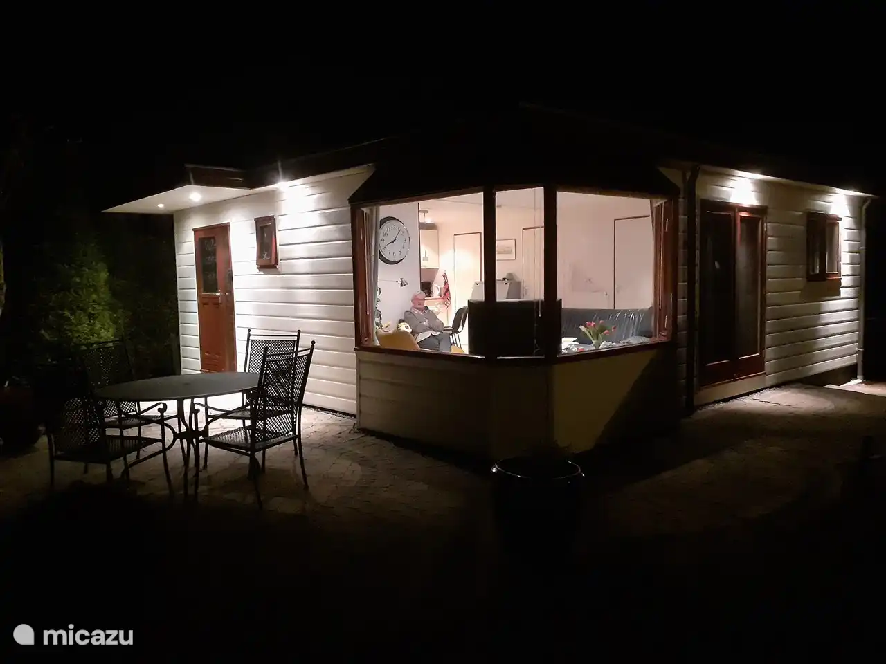 Beautiful Chalet de Parel. Also at night. Located on a beautiful rustic pond.