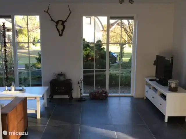 Zandhoeve 23 huren in Nederland, Gelderland, Vierhouten - boerderij Vanuit de woonkamer een ruim uitzicht rondom het huis