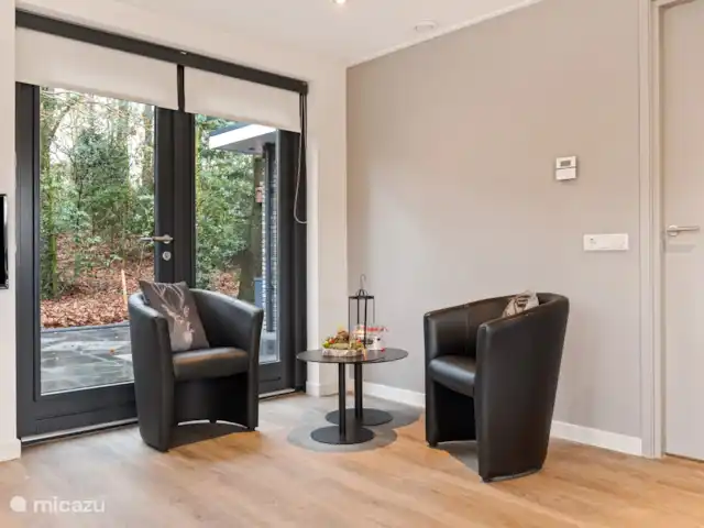 Bosrust huren in Nederland, Overijssel, Ommen - bungalow Zitje met uitzicht over de tuin