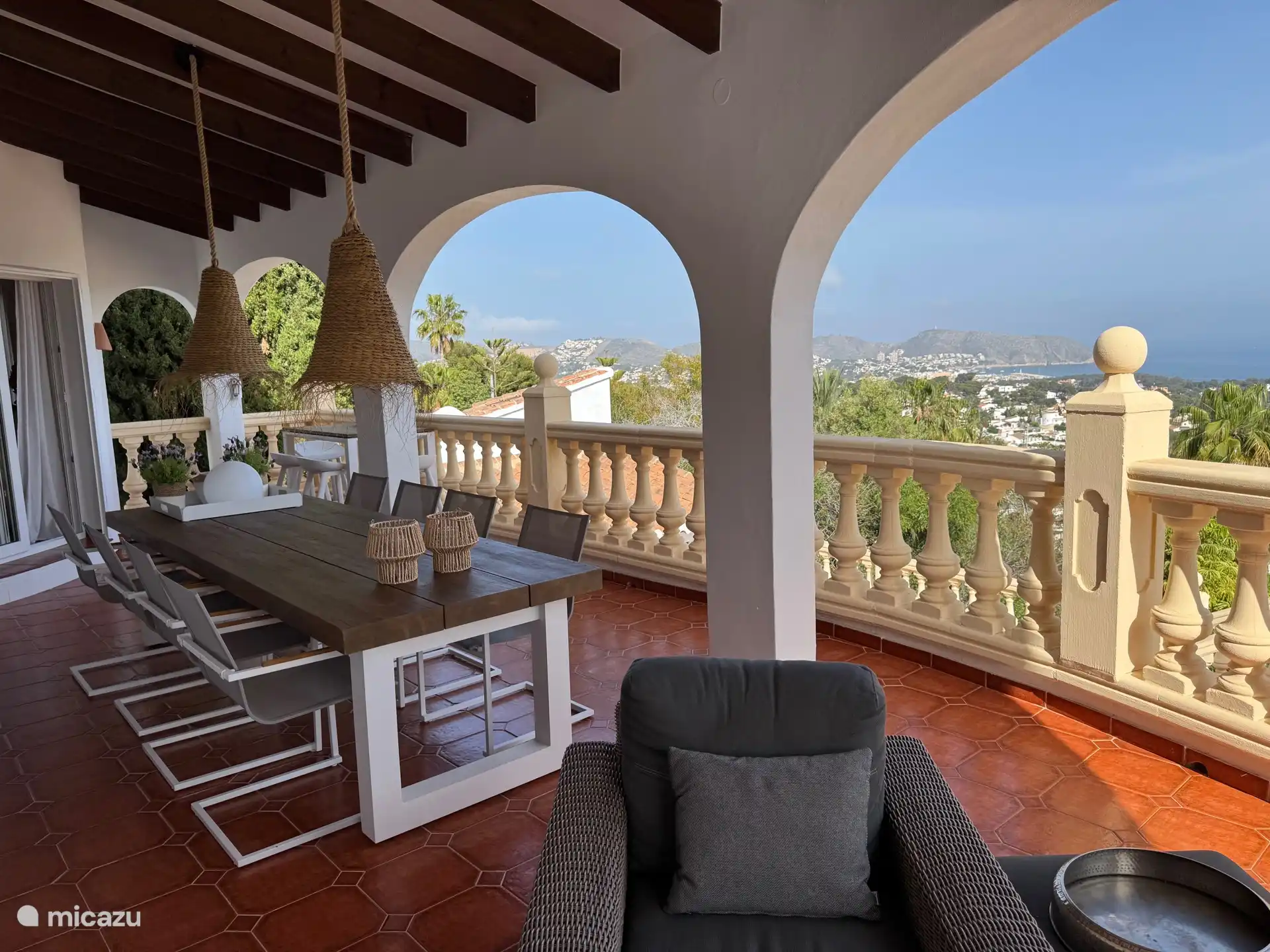 Veranda with a view and dining table for 8 people