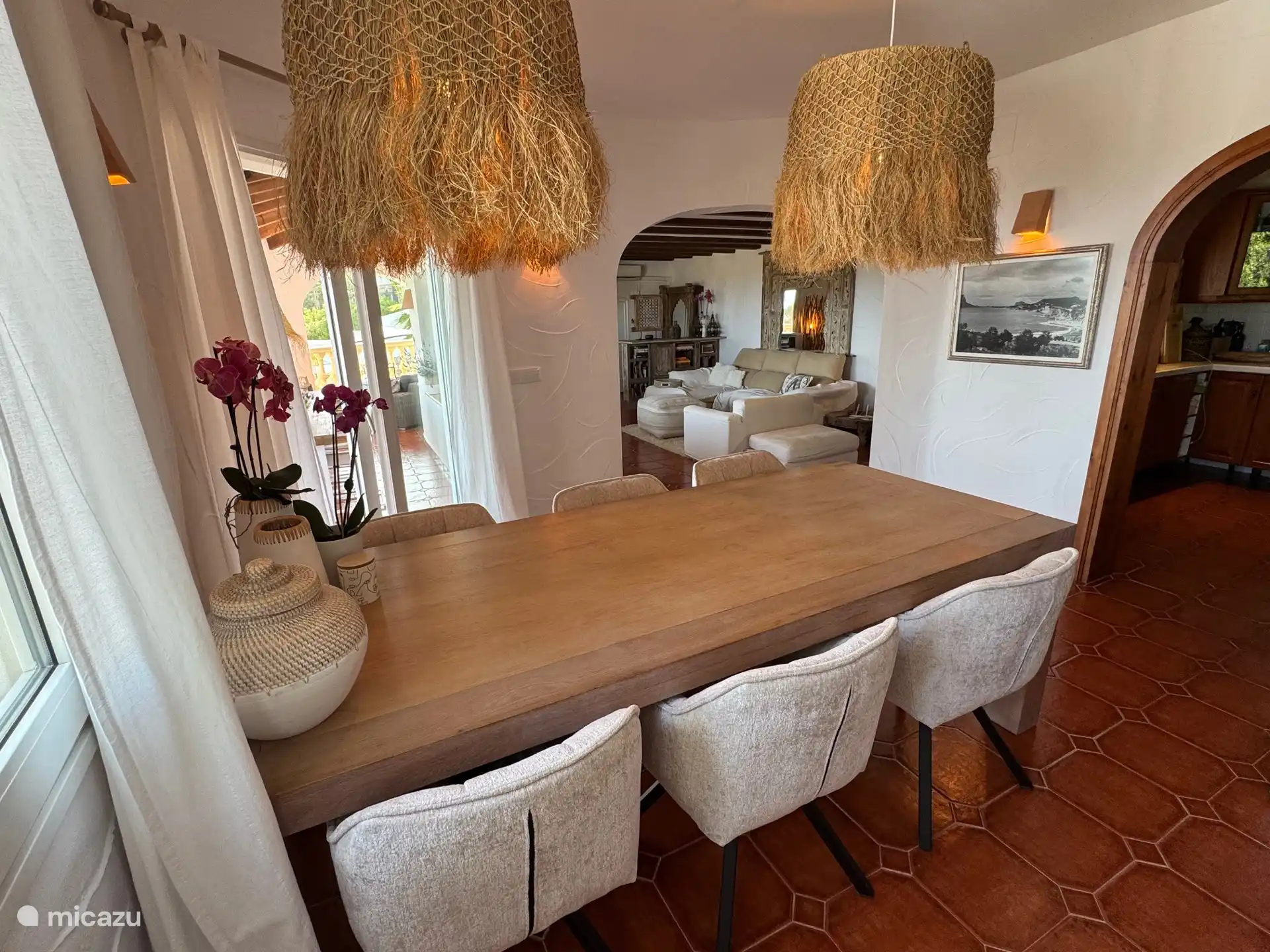 Dining room with a view of the living room and kitchen