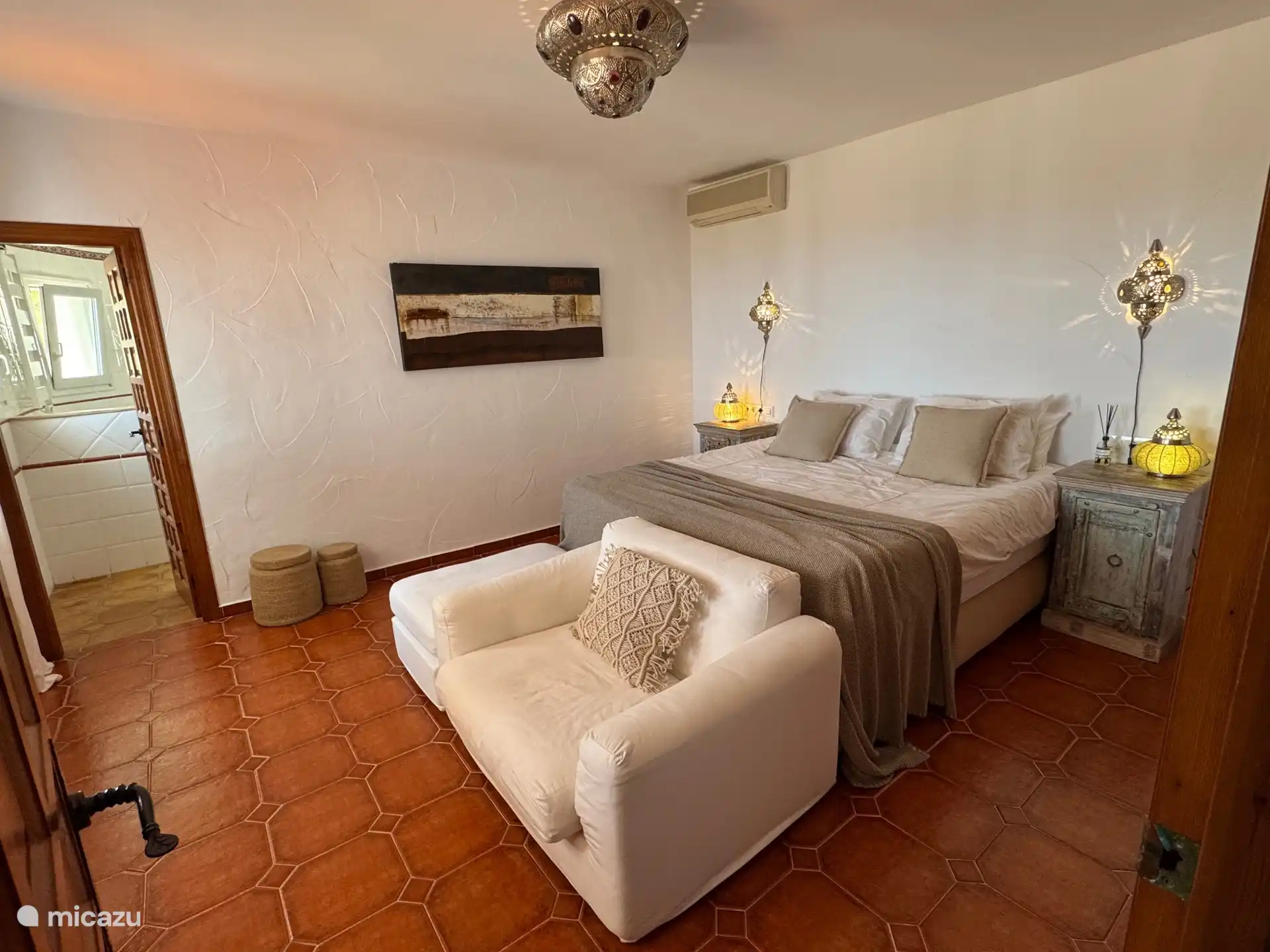 Master bedroom with door to ensuite bathroom