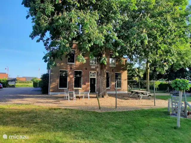 El Smousenhoek en Países Bajos, Holanda Meridional, Ouddorp - casa vacacional Mucho estacionamiento y un gran jardín.