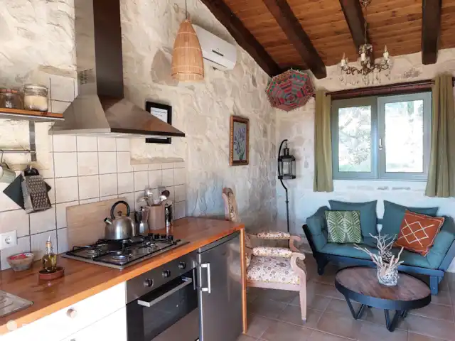 Location de Vacances Grèce, Crète, Koutsouras, gîte / cottage - Kalyvitis Cottage dans l’oliveraie Séjour avec coin cuisine