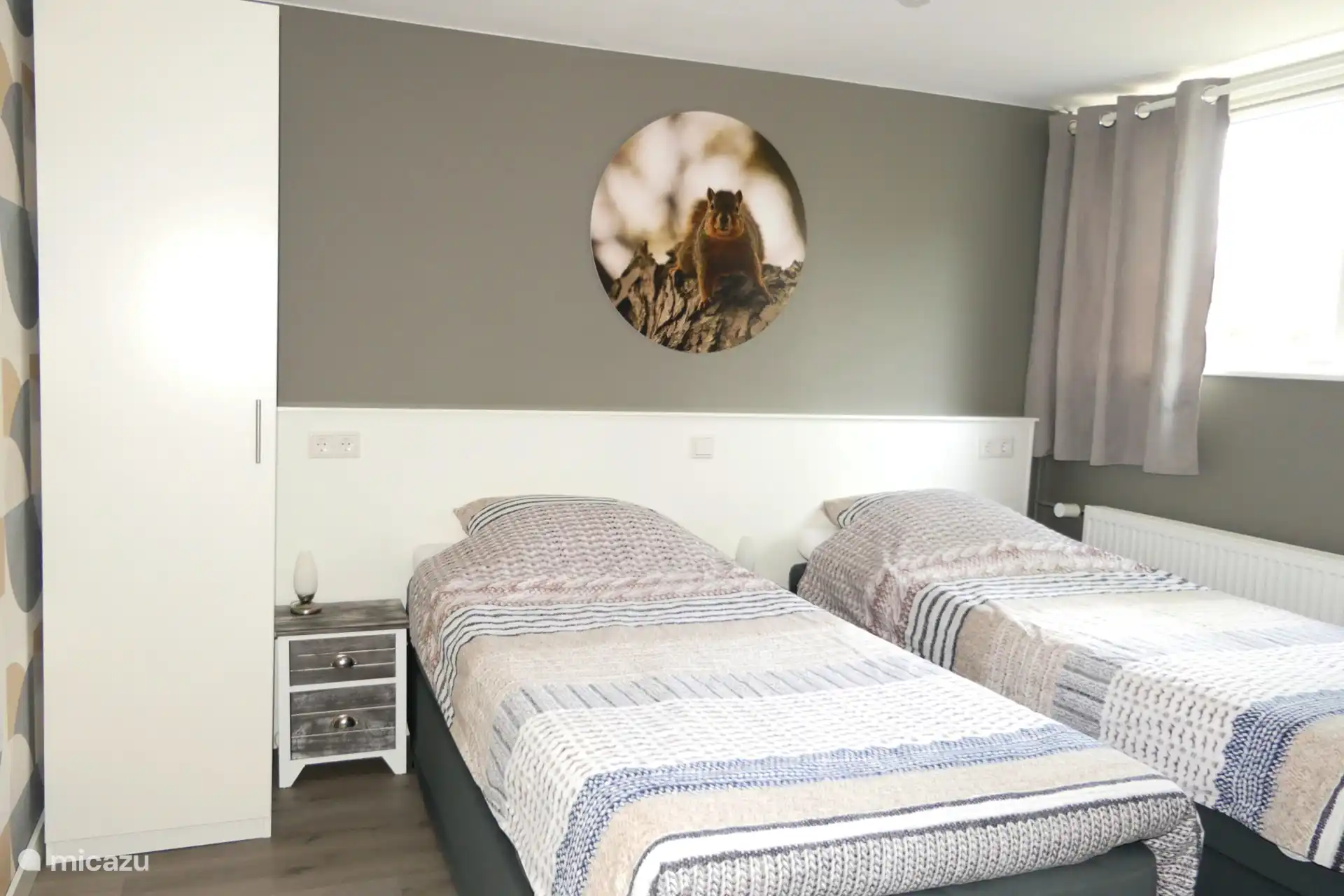 Schlafzimmer im Untergeschoss mit 2 Einzelbetten, die auch auseinander gestellt werden können.