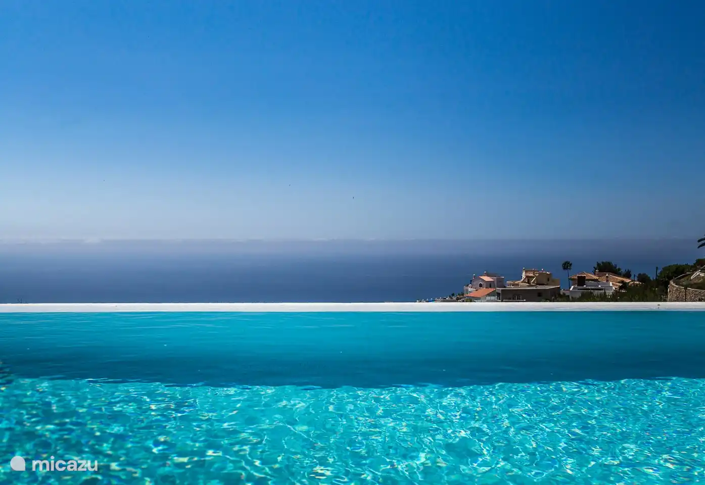 You can look out over the sea from the pool