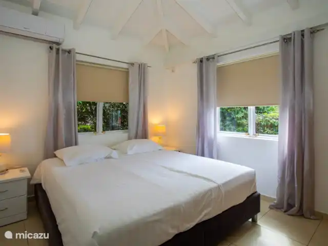 Location de Vacances Curaçao, Banda Ariba (est), Jan Thiel, maison de vacances - Kas Granjero La deuxième chambre où les lits peuvent également être séparés. Les chambres sont climatisées.