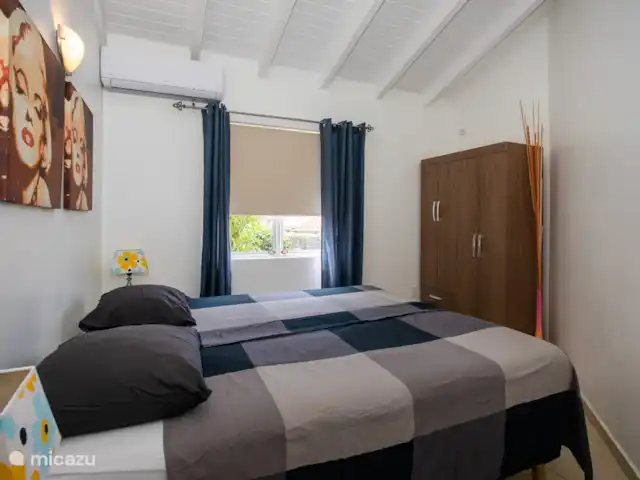 Location de Vacances Curaçao, Banda Ariba (est), Jan Thiel, maison de vacances - Kas Granjero La troisième chambre où les lits peuvent également être séparés. Les chambres sont climatisées.