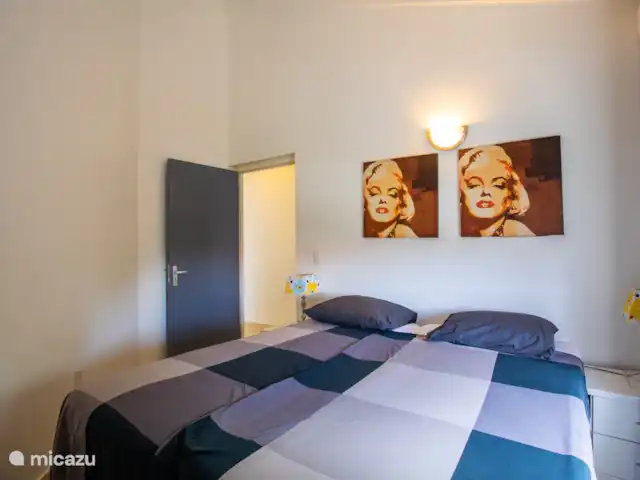 Location de Vacances Curaçao, Banda Ariba (est), Jan Thiel, maison de vacances - Kas Granjero La troisième chambre où les lits peuvent également être séparés. Les chambres sont climatisées.