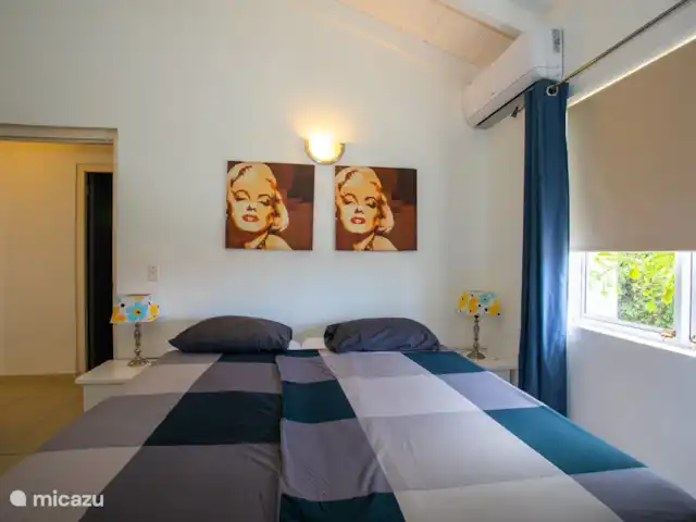 Location de Vacances Curaçao, Banda Ariba (est), Jan Thiel, maison de vacances - Kas Granjero La troisième chambre où les lits peuvent également être séparés. Les chambres sont climatisées.