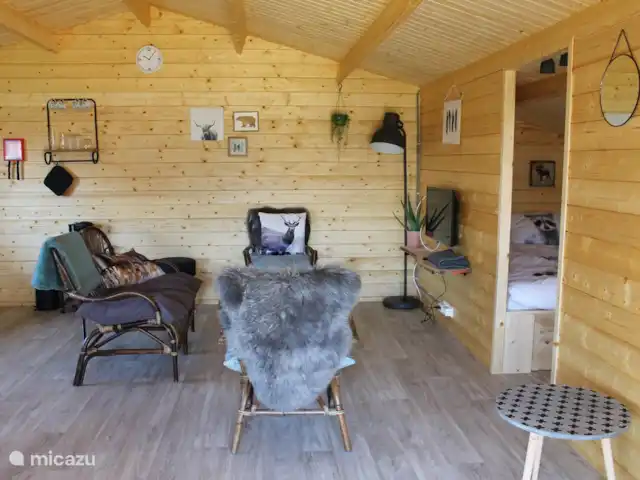 Boerenzwaluw huren in Nederland, Noord-Holland, Julianadorp aan Zee - blokhut / lodge woonkamer