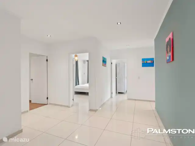 Villa familiar de lujo Grey Noble con vistas al mar en Curazao, Banda Arriba (este), Jan Thiel - villa Pasillo en planta baja con 3 dormitorios más, lavadero y baño