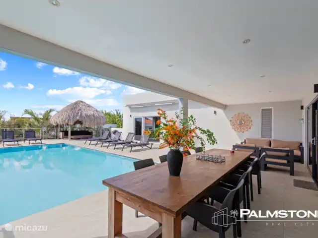 Villa familiar de lujo Grey Noble con vistas al mar en Curazao, Banda Arriba (este), Jan Thiel - villa Mesa de exterior con 8 sillas