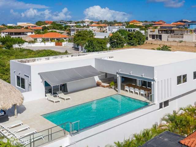Golfsurfen, Curaçao, Banda Ariba (oost), Jan Thiel, villa Grey Noble luxe gezinvilla zeezicht 