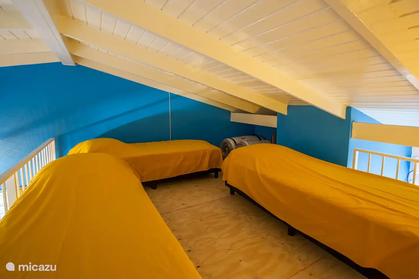 The loft has 3 single beds