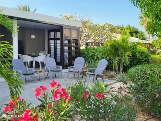BlueBay Garden à la plage et à la piscine | Curaçao, Curaçao-Centre, Blue Bay - maison de vacances Profitez de vous asseoir dans le jardin. Ombrez le manguier le matin et ombragez plus tard dans l'après-midi.