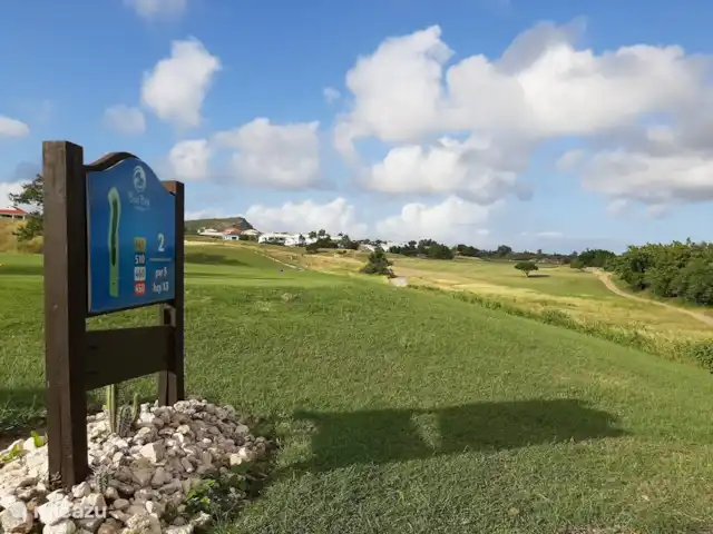 BlueBay Garden à la plage et à la piscine | Curaçao, Curaçao-Centre, Blue Bay - maison de vacances Trou 2 du parcours de golf. Le Jardin (complexe de 29 logements) est adjacent à ce trou.