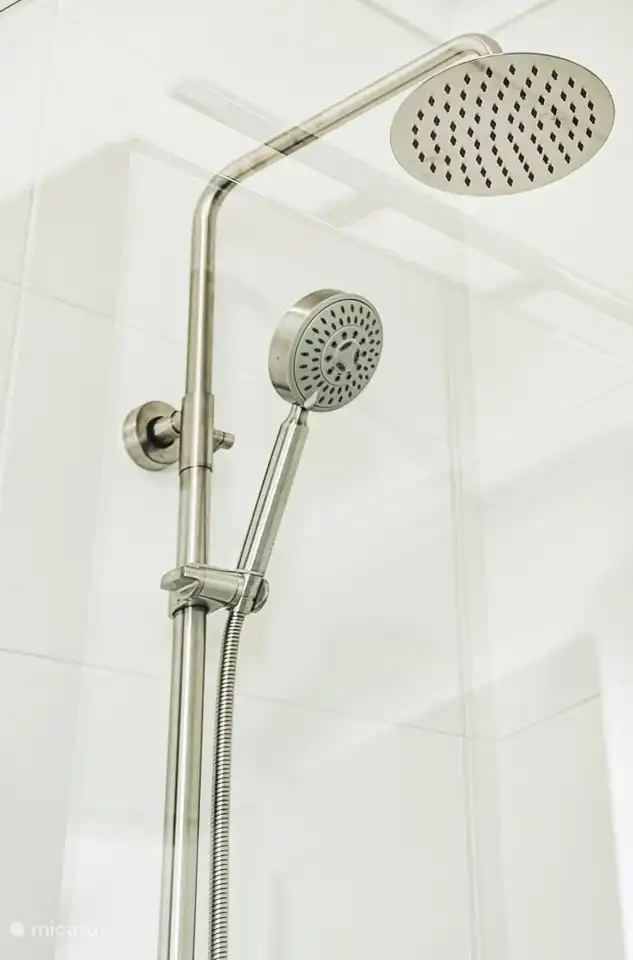 Rain showers in all bathrooms.