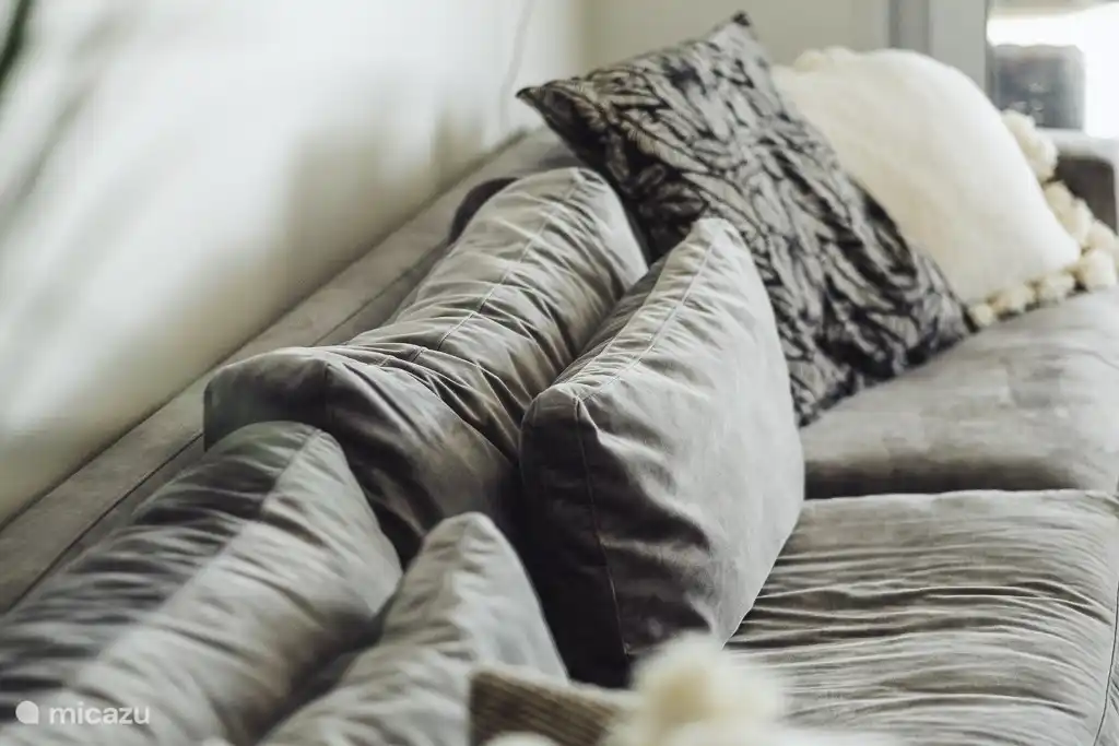 Plop down on the big couch after a long day at the beach