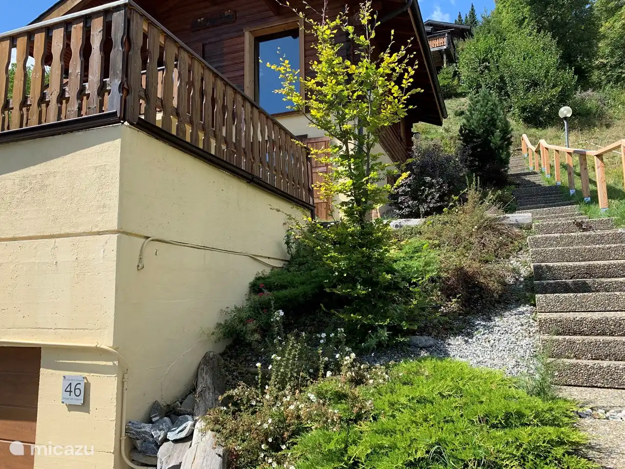 Above the garage is the sleeping floor, then above that living room, kitchen, terraces etc